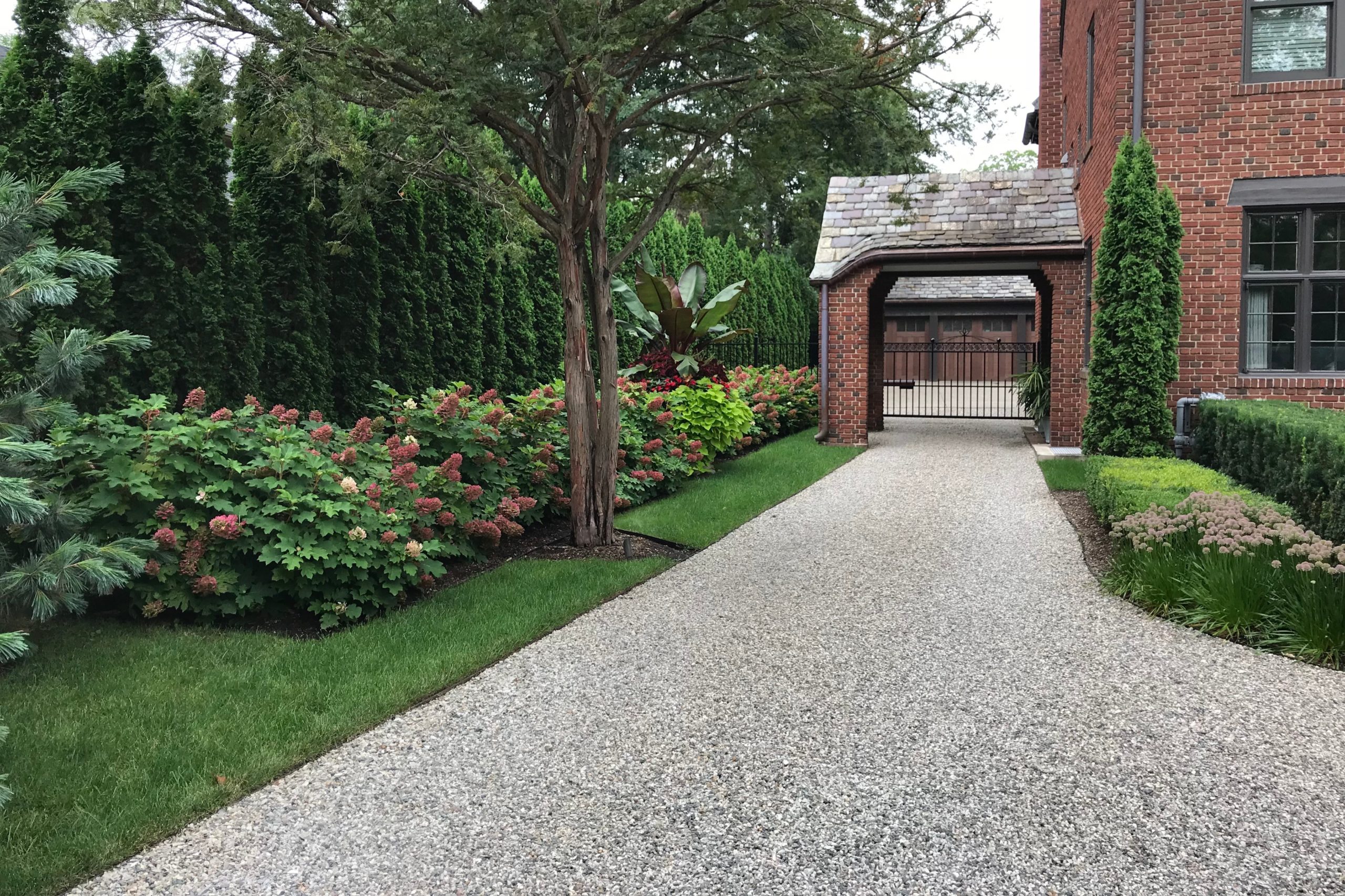 house with crush stone driveway