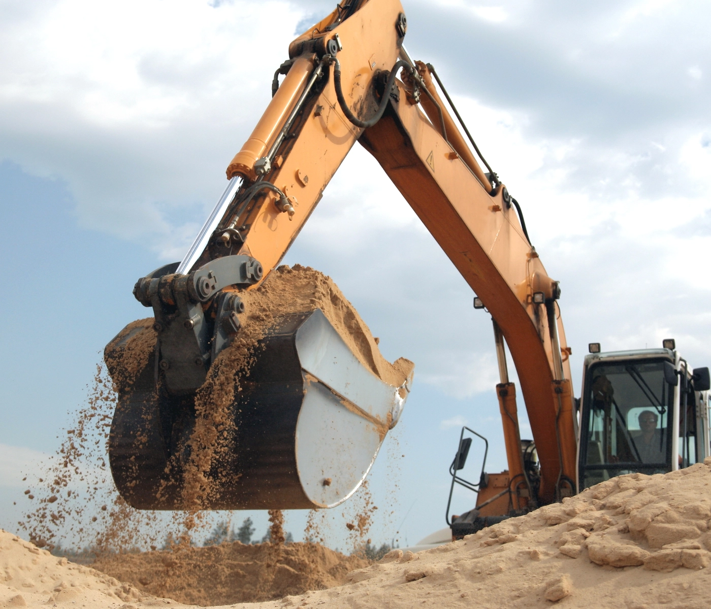 construction digger picking up dirt