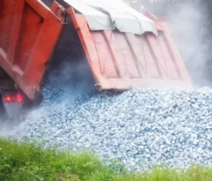 dump truck dumping gravel