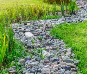 gravel drainage with grass
