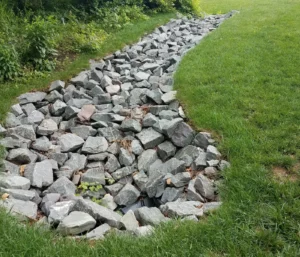 large rocks in a row for irigation & drainage