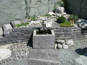 Rock garden with river rock, pea gravel and limestone