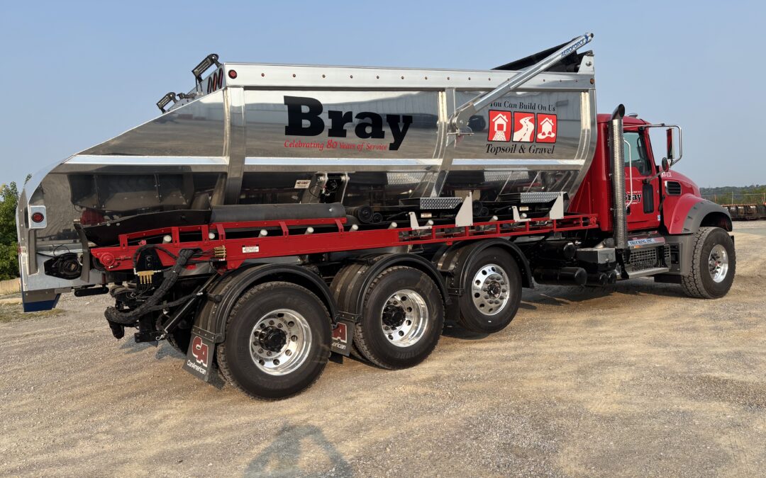 Slinger Trucks vs. Traditional Dump Trucks: Which is Better for Materiral Placement?