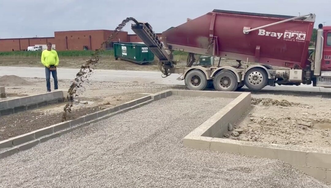 Using Slinger Trucks for Backwall: A Game Changer for Installation